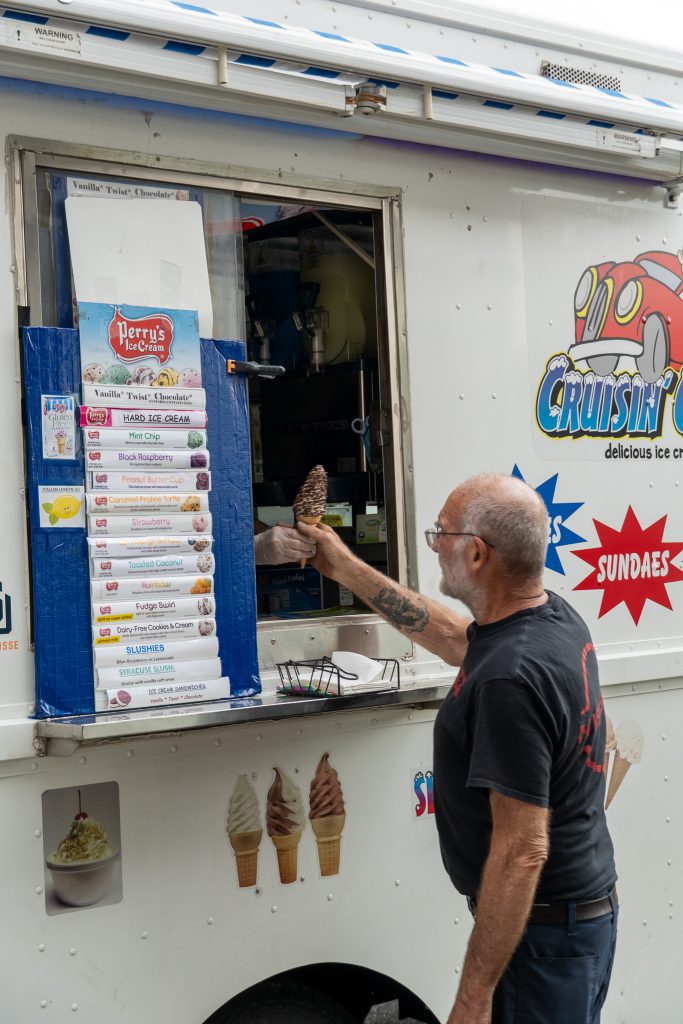 Master Technician, Karl Roessler getting a free ice cream courtesy of ACV Auto Auctions!