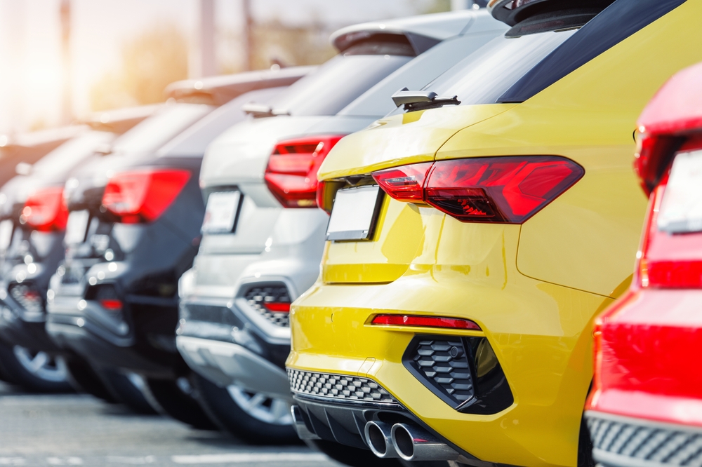 Rearview of used cars on lot.