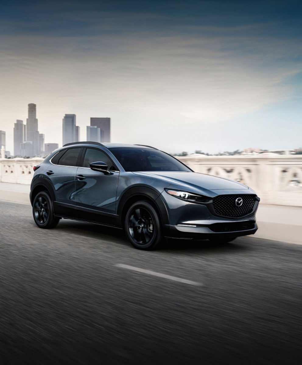 side view of a silver Mazda CX-30