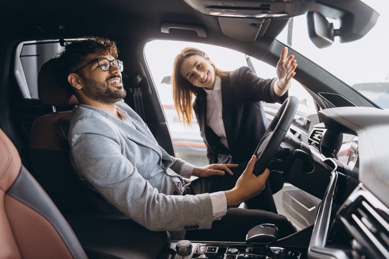 Man test driving a used car