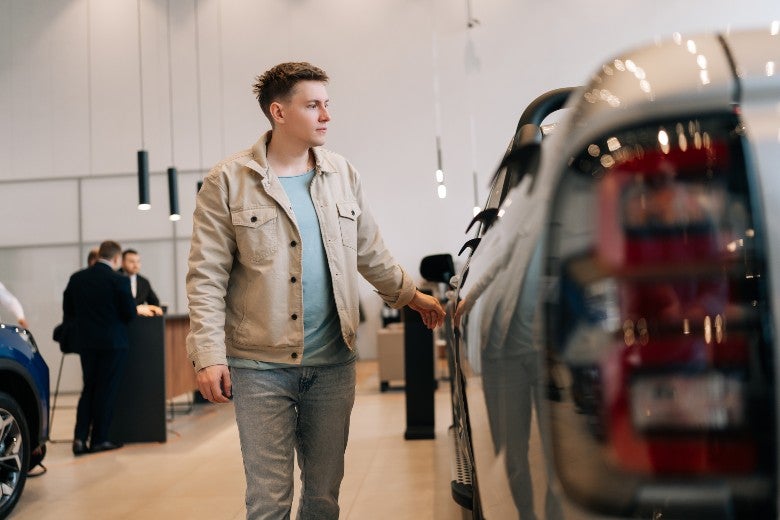 Man Shopping for Used Cars